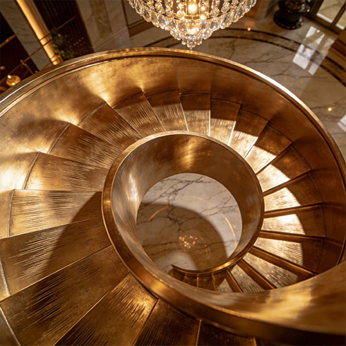 Luxe-Alu: Brushed Anodized Aluminum Spiral Staircase with Champagne Gold Finish